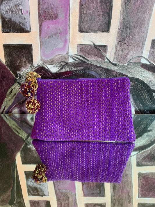 Zipper Clutch: purple and gold-with pom-pom closure